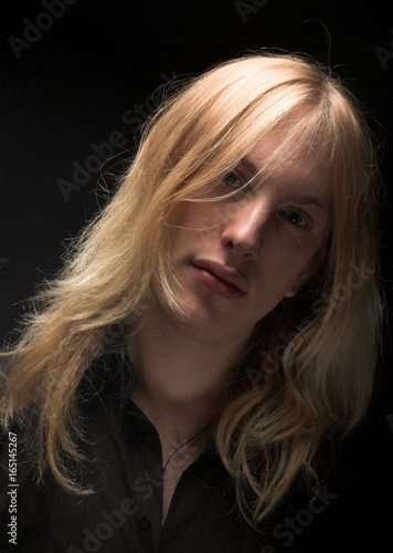 Young Man With Long Blond Hair Buy This Stock Photo And Explore