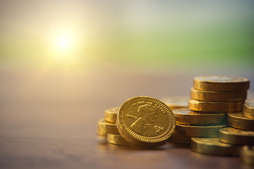 Finance and Money concept, Money coin stack sunlight