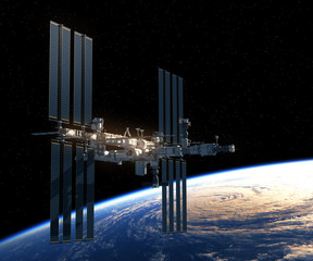 Wall Mural - flight of international space station over the earth