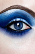 © Magdalena MM/Stocksy - Close up view of right eye with blue eyeshadow