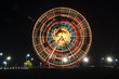 © Thomas Pickard/Stocksy - Spinning ferris wheel at  night, Batumi, Georgia.