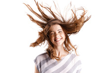 Portrait Of A Beautiful Girl With Waving Hair