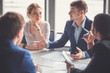 © alfa27 - Businesspeople discussing together in conference room during meeting at office