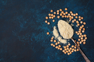 Wall Mural - Old spoon with chickpea flour