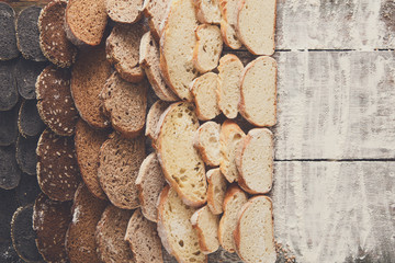 Bakery concept. Plenty of sliced bread background