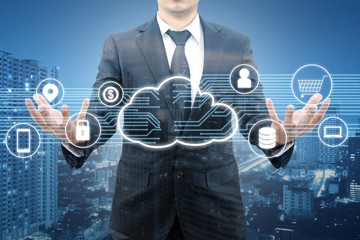 Double exposure of professional businessman connected and presented Cloud technology and internet of things and wireless network with blue tone background , business and technology concept