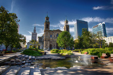 Grzybowski Square In Warsaw In A New View With An Interesting Fountain, The Church Of The Holy Spirit And Palace Of Culture And Science