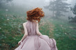 © SHOTPRIME STUDIO - Beautiful young woman running through the mountain in a long dress, nature