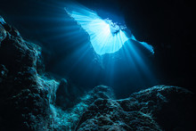 Rays Of Sunlight Into The Underwater Cave