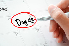 Day Off Text On The Calendar ( Or Desk Planner) Circled With Red Marker