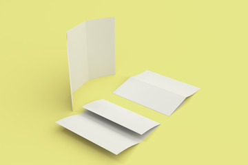 Wall Mural - Blank white three fold brochure mockup on yellow background