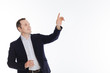 © Viacheslav Yakobchuk - Enthusiastic classy gentleman pointing at something