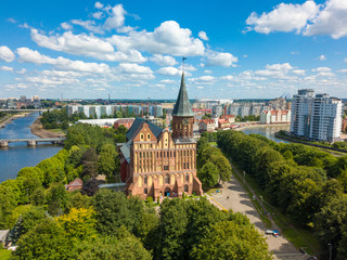 Wall Mural - Aerial cityscape of Kant Island in Kaliningrad, Russia at sunny summer day with white clouds in the blue sky