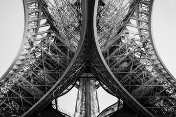 Close-up detailed view of the Eiffel tower from underneath