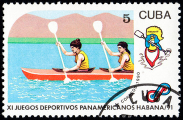 UKRAINE - CIRCA 2017: A postage stamp printed in Cuba shows Kayaking from series 11th Pan American Games, circa 1990