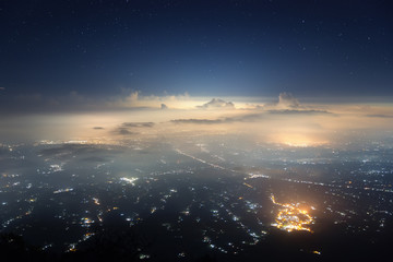 Wall Mural - city of stars. view of bali island from agung volcano in the night.