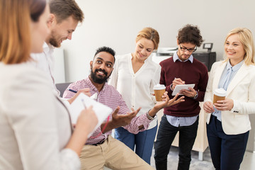 Wall Mural - happy business team drinking coffee at office