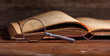 © Rawf8 - Vintage book and magnifying glass on wooden desk