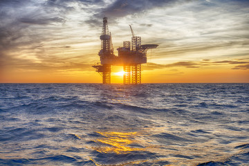 Wall Mural - HDR of Offshore Jack Up Rig in The Middle of The Sea at Sunset Time 