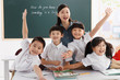 © View Stock - Teacher with elementary school students