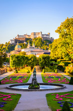 Beautiful View Of Fortress Hohensalzburg From Famous Mirabell Garden In Salzburg, Austria