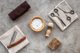 Fototapeta Sypialnia - Preparing for men shaving. Shaving brush, razor, foam, sciccors on grey stone table background top view