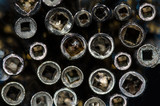 Fototapeta  - Abstract: View Into the Barrel of a Set of Antique Pocket Watch Keys