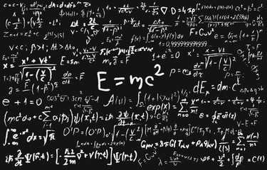 Wall Mural - blackboard inscribed with scientific formulas and calculations in physics and mathematics.