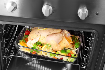 Sticker - Casserole dish with whole raw turkey and other ingredients in oven