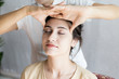 © Jestercine - Beautiful young woman having head massage in spa salon. Woman with thai massage. Woman with relax emotion.