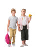 © LIGHTFIELD STUDIOS - happy adorable children holding backpack and yellow flowers while standing together and holding hands isolated on white