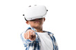 © LIGHTFIELD STUDIOS - african american boy wearing virtual reality headset and pointing at camera isolated on white