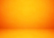 Empty orange studio room, used as background for display your products - Vector