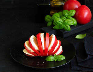 Wall Mural - Italian caprese salad with tomatoes and mozzarella.