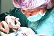 © nimon_t - veterinarian surgeons in operating room