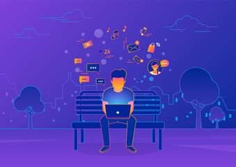 Wall Mural - young man sitting in the street and working with laptop on violet background