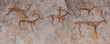 Drawings in a cave on the wall, painted with ocher rock. Primitive man, primitive Neanderthal. The hunter hunts a deer. Stone Age, Ice Age. Caveman.