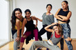 © DragonImages - Group Portrait of Smiling Dancers