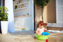Cute Redhead Toddler Baby Having Fun With Water On Summer Terrace