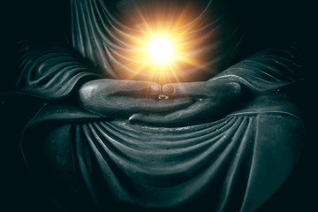 hand of buddha with light of wisdom and power of breath in religion of asian concept.