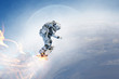 © Sergey Nivens - Spaceman on flying board. Mixed media