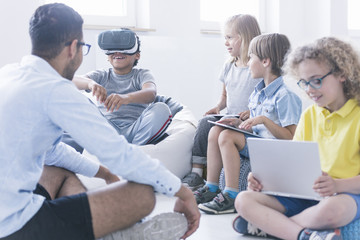 boy uses vr glasses