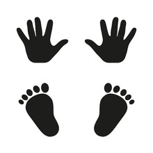 Prints Of Hands And Feet Of A Child On A White Background