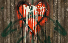 Red Graffiti Heart On Wooden Wall