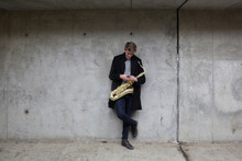 Saxophone Player In Urban Tunnel