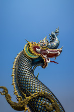 The Naga Statue On Blue Sky Background In Thailand.