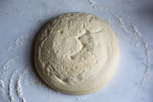 Close-up Of Raw Dough For Pizza