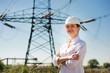© nagaets - beautiful woman engineer work at an electrical substation.