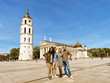 © Roman Babakin - Smiling young multiracial friends on Cathedral square of Vilnius