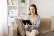 © Syda Productions - happy woman with tablet pc at home